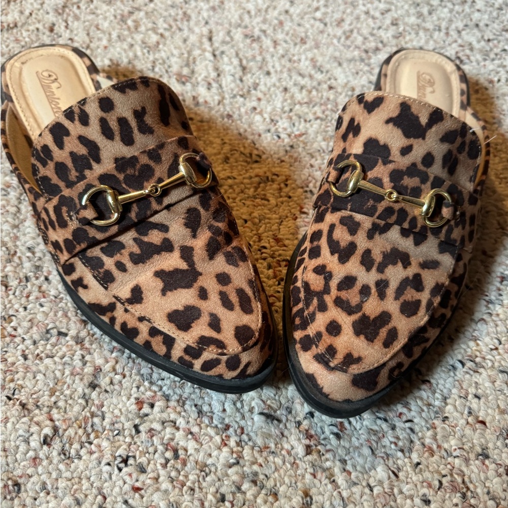 Slip on, mule flats. Lightly used with no signs of wear.